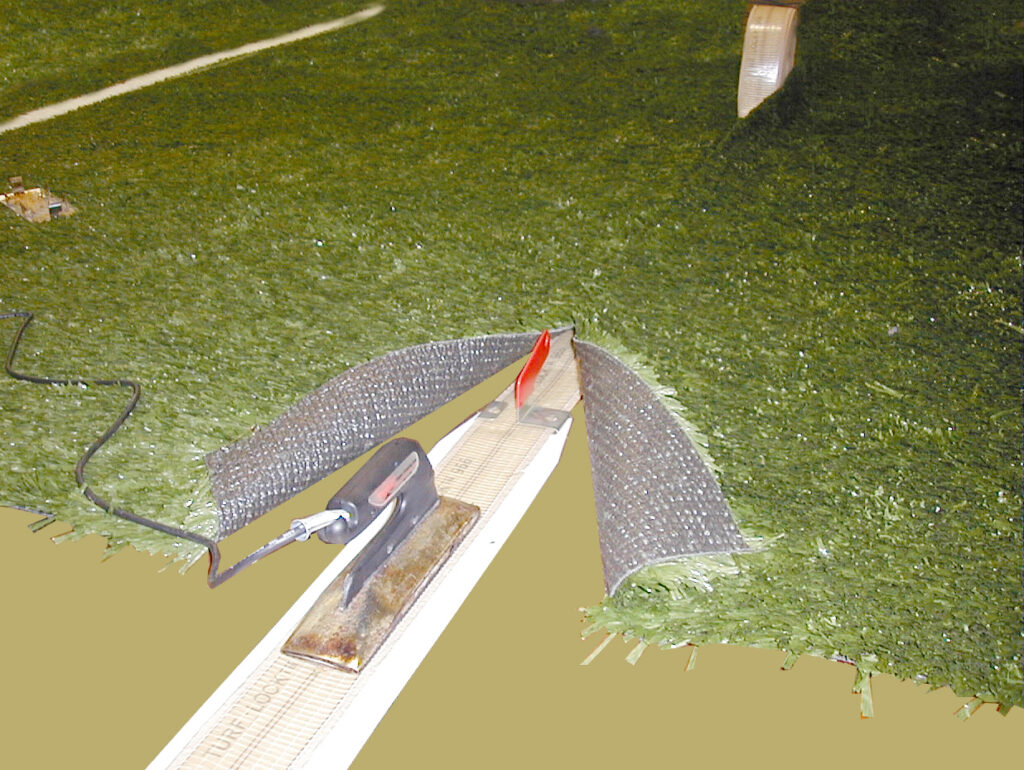 Bond's hot melt turf seaming method