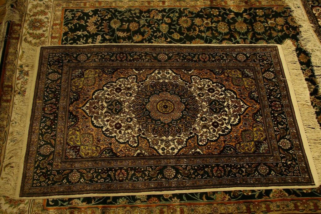 https://www.bondproducts.com/wp-content/uploads/2022/03/difference-between-a-carpet-and-a-rug-q-1024x682.jpg